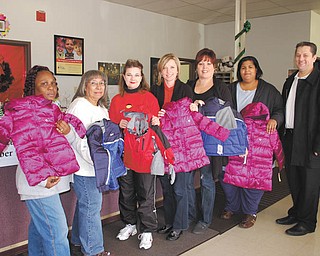 Children in the Mahoning County Head Start program received 55 brand-new winter coats through the efforts and donations of the Boardman Rotary. The third annual giveaway was organized by Rotary member Ryan Cuffle. Using creative shopping techniques, Cuffle was able to stretch the initial investment to provide an additional 25 coats.  Rotarians and Boardman High School Interact members delivered the coats to various Head Start locations throughout the county. Cuffle, far right, is shown with McCartney Road Learning Center staff, left to right: Georgetta Madison, Donna Wynn, Chrystal Wurm, Michelle Shafer, Evelyn Torres and Nichelle Moore.