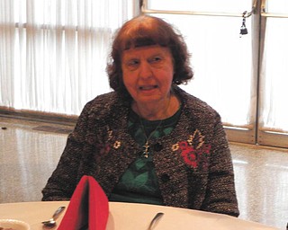 Seated at the Youngstown Lions Club’s 91st Christmas party is 83-year old Virginia Ayres. She has attended the event every year from age 7. This year’s party took place Dec. 7 at the Youngstown Saxon Club. There were 119 Youngstown school children in attendance. Each child received gifts from Santa and Mrs. Claus and a gift bag from the Lions club members. The event was made possible by the club’s annual Turtle Derby earlier this year.