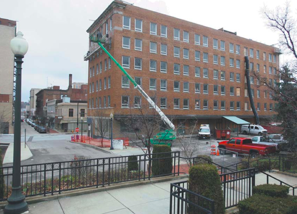 Construction work progresses on the Erie Terminal building, a $9 million, 65-person residential complex that will be the latest, biggest brick in a critical bridge between downtown and the Youngstown State University campus. Dominic Marchionda and his wife, Jackie, are spearheading the project.