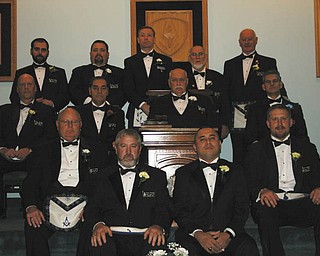Argus Lodge 545 F&AM in Canfield installed officers for the 2012 term Dec. 9. Thomas J. Hallden of Boardman was installed as worshipful master. Hallden has been a member of Argus Lodge since 1976 and was master in 2001. He is retired from the trucking industry. Other officers installed were (left to right): Row 1: Charles Prachick, senior steward, and Raymond Gonzalez, junior steward. Row 2: Dale Hawkins, senior deacon, and Ryan Hamilton, junior deacon. Row 3: Denny Furman, LEO; Russell Gillam Jr., senior warden; Hallden; and Marc Roca, junior warden. Row 4: Patrick Anderson, chaplain; Rich Percic, trustee; Russell Gillam III, treasurer; Donald Huntley, secretary; and Thomas Eaton, Tyler. Argus Lodge meets on the second and fourth Fridays of each month.