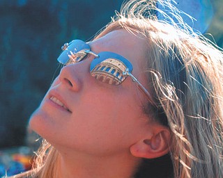 The reflection of The Colosseum can be seen in the sunglasses of Leanna Hartsough, a freshmen of YSU. Taken by Lana Van Auker of Canfield during a trip to Italy in June 2011.