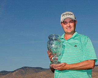 Jason Kokrak with his trophy after winning the Albertsons Boise Open, presented by Kraft, ending September 18, 2011.