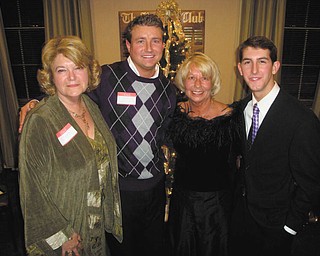 The Trumbull County Republican Party gave out awards Dec. 10 at their annual Christmas party, which took place at the Buckeye Club in Warren. Chairman Kathi Creed, second from right, presented the awards to Barbara Rosier-Tryon, left, Republican Woman of the Year; and Tom O’Neill, second from left, and Nick Santucci, right, who received Young Republican of the Year awards. Missing from the photo is Al Haberstroh, Republican Man of the Year. All recipients received letters of congratulations from Sen. Rob Portman, Gov. John Kasich and Lt. Gov. Mary Taylor.