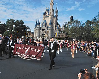 The Boardman Spartans Marching Band traveled to Disney Theme Parks from Dec. 27 to Jan. 1. Under the direction of Thomas Ruggieri, director of bands, and Michael Shevok, assistant director, the band participated in “Mickey’s Once Upon A Christmastime” parade at Disney’s Magic Kingdom. Leading the band were field conductors Tony Colella, right, and Carmen Moradian, left. While there, the band’s Jazz Ensemble 1, under the direction of Ruggieri, also performed at Downtown Disney’s Waterside Stage.