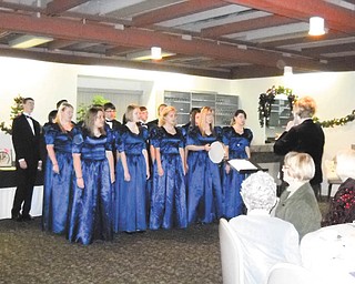 American Association of University Women, Warren-Trumbull County Branch, were treated recently to an evening of holiday entertainment. Members of Lakeview Madrigal Singers, above, under the direction of Bonnie Chronister, performed several selections. The next meeting of AAUW will be Feb. 6. For information on becoming a member or attending a meeting call 330-898-3696.