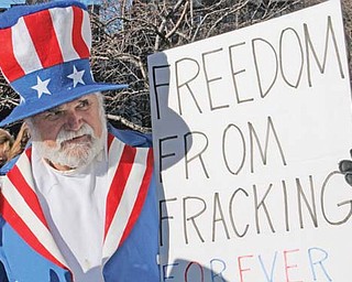 Trumbull County resident Werner Lange dressed as Uncle Sam showed his feelings on fracking.