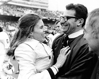 Penn State football coach Joe Paterno is embraced by his wife, Sue, following Penn State's victory over Texas in the Cotton Bowl in Dallas, Tx., on Jan. 1, 1972. The Lions beat the Longhorns 30-6. (AP Photo)