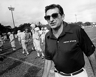 Penn State head football coach Joe Paterno is shown on the field as his team starts a drill session in New Orleans, La., Dec. 29, 1983. The Nittany Lions meet Georgia in the Sugar Bowl for the national title Jan. 1. (AP Photo/Jack Thornell)