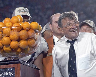 Former Penn State head coach Joe Paterno, seen in this 2006 file photo after the Nittany Lions defeated Florida State in the Orange Bowl, died Sunday, January 22, 2012. He was 85. (Clem Murray/Philadelphia Inquirer/MCT)