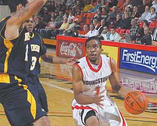 Youngstown State junior guard Blake Allen (1) has been getting in as much practice time as possible, and the extra work has paid off . The Penguins picked up two quality Horizon League wins over the weekend downing Milwaukee and Green Bay and Allen was named the conference’s Player of the Week.