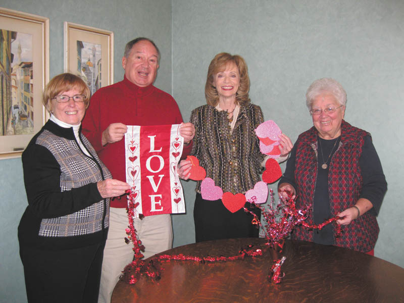Decorating for dinner: Eileen and Ray Novotny, left, Joan Sonnett and Sister Nancy Dawson, right, general superior of the Ursuline Sisters of Youngstown, ready decorations for the Ursuline Center’s annual Valentine’s Day dinner scheduled for 6:30 p.m. Feb. 14 in the center’s auditorium, 4280 Shields Road, Canfield. Entertainment will be offered by the Canfield High School Music Trio. Tickets are $20, and proceeds will benefit various ministries offered by the Ursuline Sisters. For tickets or more information, call Peggy Eicher at 330-533-7681 or e-mail her at peggyeicher@gmail.com.