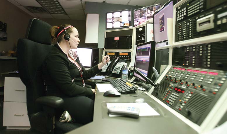 Boardman dispatcher Lauren Bruno, above, directs emergency calls to police and fire Wednesday. The process of hiring dispatchers has been bumped up from September 2012 to now.