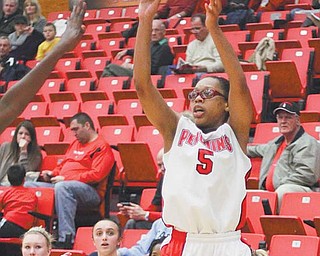 Youngstown State senior guard Kenya Middlebrooks (5) goes up for a shot during an Horizon League basketball
game Thursday against Detroit at YSU’s Beeghly Center. The Penguins dropped the Titans, 80-67, behind
Middlebrooks, who scored a career-high 30 points, including a school-record eight 3-pointers.
