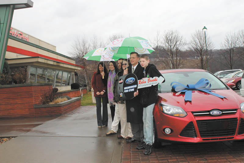 Austintown residents Ron and Robin Brooks won a new 2012 Ford Focus, which was presented to them in Pittsburgh on Jan. 17. Eat’n Park Restaurants and the Neighborhood Ford Store teamed up for the presentation, a result of Eat’n Park’s Caring for Kids Campaign, which raised money for children’s hospitals and children’s charities in Pennsylvania, Ohio and West Virginia. The Ford raffle raised more than $140,000 for the campaign. The Brookses’ winning ticket was drawn Dec. 14 by a patient at Children’s Hospital of Pittsburgh from more than 70,000 tickets sold. The new car will replace the Brooks family’s minivan, which has racked up more than 250,000 miles. Ron Brooks will use the Focus for his weekly drives to the Cleveland Clinic, where he receives medical treatment. The Neighborhood Ford Store, which comprises 82 Ford Dealers in Southwest Pennsylvania, southeast Ohio and the panhandles of Maryland and Virginia, donated the Focus this year. They also donated a new Ford for last year’s Caring For Kids Campaign.