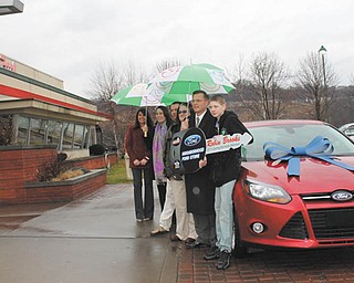Austintown residents Ron and Robin Brooks won a new 2012 Ford Focus, which was presented to them in Pittsburgh on Jan. 17. Eat’n Park Restaurants and the Neighborhood Ford Store teamed up for the presentation, a result of Eat’n Park’s Caring for Kids Campaign, which raised money for children’s hospitals and children’s charities in Pennsylvania, Ohio and West Virginia. The Ford raffle raised more than $140,000 for the campaign. The Brookses’ winning ticket was drawn Dec. 14 by a patient at Children’s Hospital of Pittsburgh from more than 70,000 tickets sold. The new car will replace the Brooks family’s minivan, which has racked up more than 250,000 miles. Ron Brooks will use the Focus for his weekly drives to the Cleveland Clinic, where he receives medical treatment. The Neighborhood Ford Store, which comprises 82 Ford Dealers in Southwest Pennsylvania, southeast Ohio and the panhandles of Maryland and Virginia, donated the Focus this year. They also donated a new Ford for last year’s Caring For Kids Campaign.