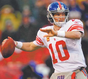 New York Giants quarterback Eli Manning throws during the first half of the NFC Championship against the San Francisco 49ers in San Francisco.