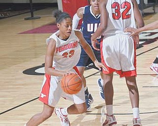 Youngstown State’s Melissa Thompson (23) dribbles upcourt after grabbing a rebound during a recent game. Thompson and the Penguins are preparing for Saturday’s game against Butler.