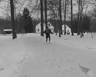 Susie McKinney of North Jackson was 17 when she skated up and down her driveway after an ice storm in February of 2011. Photo sent in by her mom, Mary Sue McKinney.
