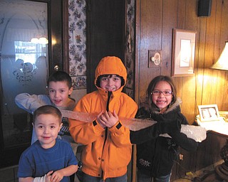 Autumn Feo sent in this photo of when she and her cousins found a huge icicle outside and brought it in to show everyone. From back left are Andrew Garchar, Jeffrey Feo, Gianna Garchar and in the front, Rocco Garchar.