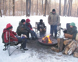 Boy Scout Troop 101 takes a break at the Klondike Derby at Camp Stambaugh. Photo by Bob Granchie, troop chaplain.