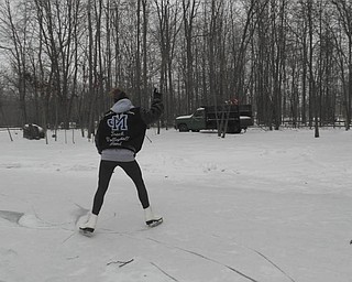 Susie McKinney of North Jackson was 17 when she skated up and down her driveway after an ice storm in February of 2011. Photo sent in by her mom, Mary Sue McKinney.