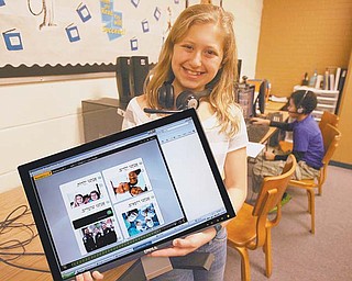 Lexi Burdman, a sixth-grader at Akiva Academy, shows off Rosetta Stone’s Hebrew language program. The school is using the program to supplement Hebrew instruction.