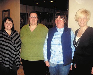 Girard Junior Women: Girard Junior Women officers, from left, Bree Quesenberry, Kendra Allen and Roberta Lawrentz greet Heather Walker, right, of the Girard Free Library. Walker recently spoke to GJW about various programs offered at the library and explained the benefits of CLEVNET, a Northeast Ohio library consortium which GFL recently joined. The group meets on the second Thursday of each month, and Kathie Rossell will host the next meeting. The group welcomes new members interested in serving the community.