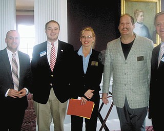A full slate of state and national level legislators recently took part in a brunch sponsored by the League of Women Voters of Greater Youngstown. Discussing the format for their presentations are, from left, state Sen. Joe Schiavoni (D); George Brown for U.S. Sen. Rob Portman (R); Attorney Michelle Simonelli; Terry Esarco; and state Rep. Ron Gerberry (D). Also presenting were state Sen. Capri Cafaro (D), state Rep. Robert Hagan (D) and U.S. Sen. Sherrod Brown (D).