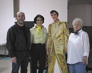 Members of the Friendly Squares, a square dance club, danced recently at a 1950s-themed event for their monthly meeting. From left to right are Tony Wildman of Cortland, Itala Landers of Canfield, “Elvis” and JoAnn Sloan of Warren.