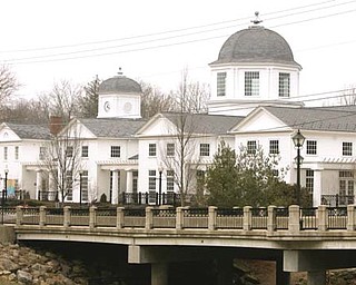 The Poland Library, built in 2001, sits along the Yellow Creek.