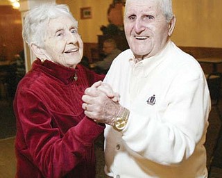 Bill and Molly Gales dance at Avon Oaks Ballroom in Girard. In their younger years, Bill and Molly would go dancing every weekend, and they were the first ones on and the last ones off the floor. Nowadays they stick to a simple slow dance each evening.