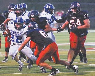 Fitch defensive lineman Billy Price (54), shown here in a game against Poland, became one of the first players to commit to Ohio State’s 2013 recruiting class.