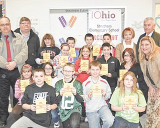 Rotary participates in dictionary project: Each year, Struthers Rotary donates dictionaries to fourth-grade students in Struthers, Campbell and Lowellville. The Rotary “Dictionary Project” goal is to assist students to become good writers, active readers, creative thinkers and resourceful learners. Students at Struthers Elementary School are shown with Rotarians, from left, Tom Baringer, Mike Evanson, Marge Diorio and Dan Becker. School principal Maggie Kowach is at far right.