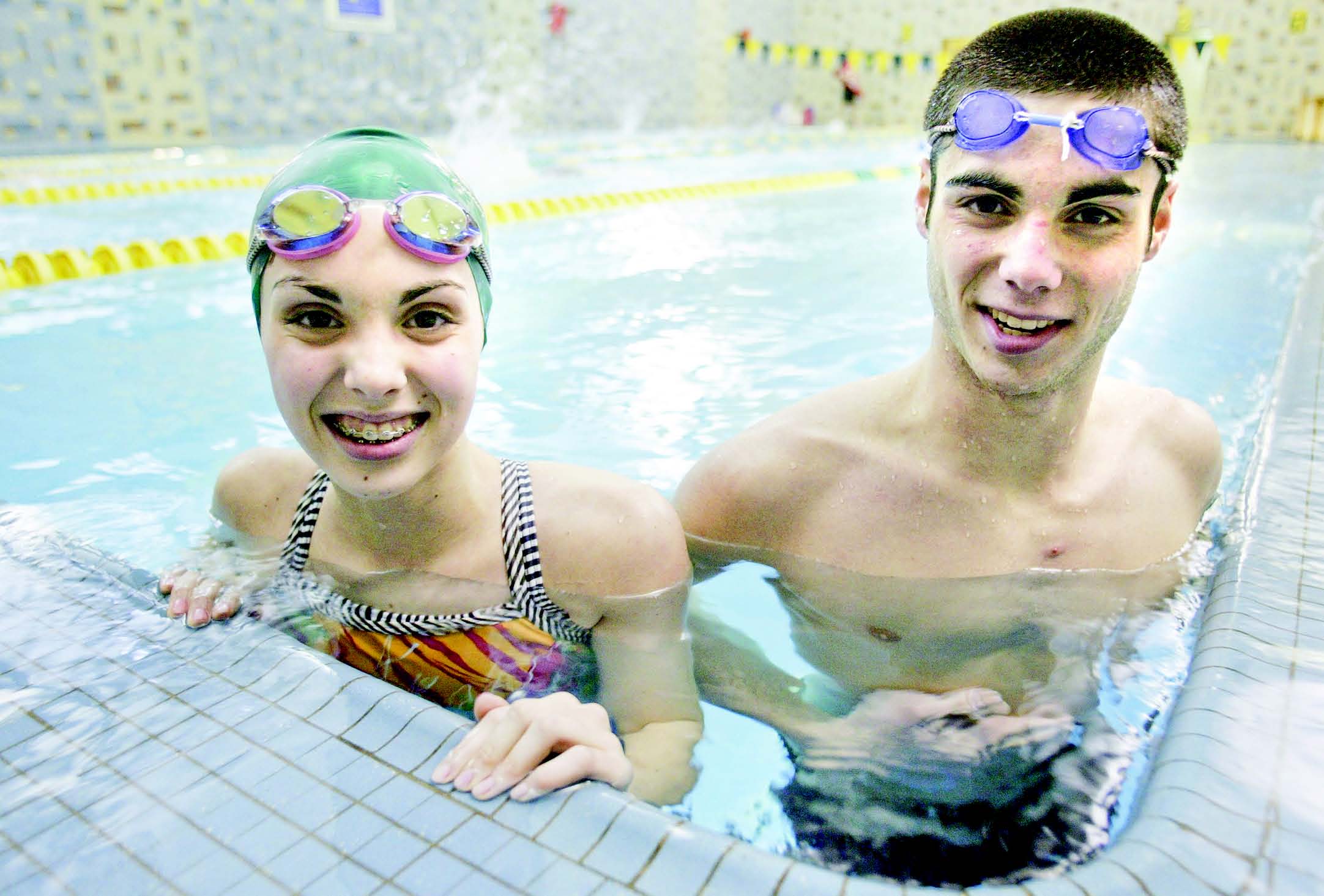 Cardinal Mooney swimmers Annie and Joe Boniface practice in the pool at the YMCA in Youngstown. The Cardinals did not have a swim team until eight years ago when the siblings’ older brother Tom proposed the idea.