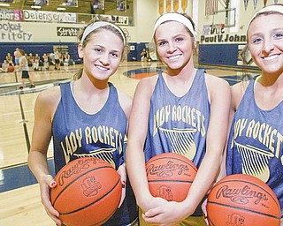 Lowellville High’s girls basketball team has three 1,000 point scorers. From left are seniors Emily Carlson, Ashley Moore and Taylor Hvisdak.