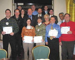 Austintown Rotary President Deanna Spirko recently presented certificates acknowledging three months of perfect attendance to 16 members, almost half of the club membership. Recipients of the award are, left to right, front row, Spirko, Hillary Prestridge, Robin Stock, Karl Rein, Ram Kasuganti and Gary Reel. Middle row: Brian Frederick, Ron Carroll, Jen Connolly, Chuck Baker, Mark Cole and Mitch Dalvin. Back row: Tony Cebriak, Mal Culp and Brian Laraway. Absent from the picture is Jerry Haber.