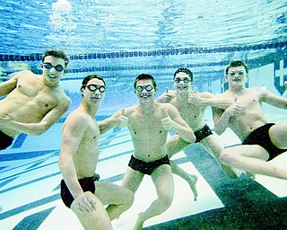 Canfield swimmers, from left, Michael DiDomenico Nicholas Montalto, Mark Dalvin, Daniel Bogen and Connor Brady clown around during practice Tuesday in the pool at Youngstown State University. The five will be competing this weekend at the Division II state swim meet in Canton.