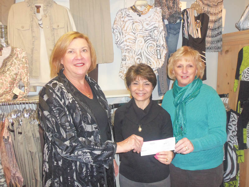 Easter Seals Holiday Brunch: After the 2011 Angels of Easter Seals Holiday Brunch, Possessions owner Linda Deckant, left, presented a $400 check 
to Carol O’Neill, center, president of Angels, and Jacie Ridel, 
co-chairman of the event. Possessions presented a fashion
show at the event and sold accessories.