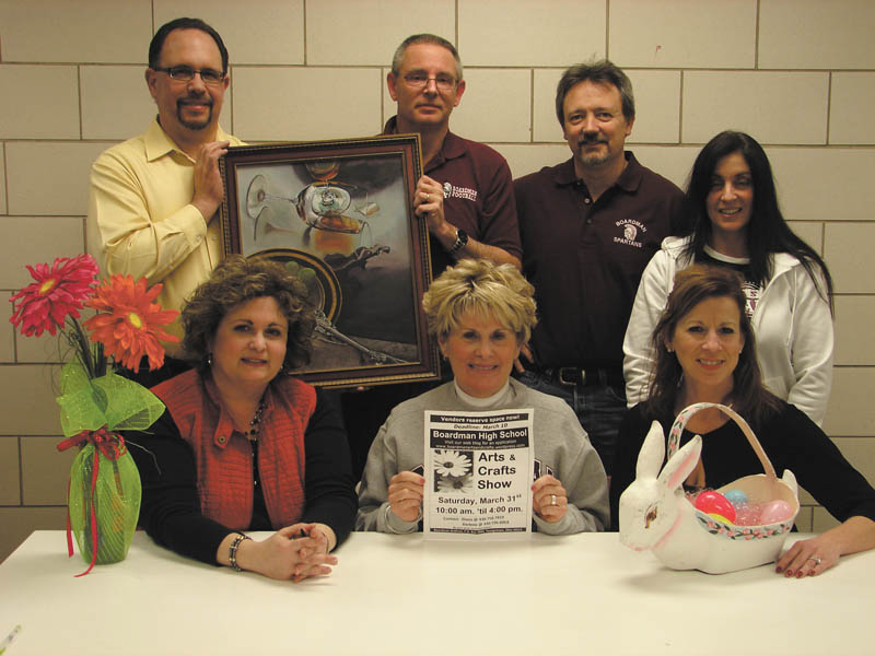 The Boardman High School Gridiron Club is planning an arts and craft show on March 31 at the school. Committee members for the event are, left to right, seated, Darlene Morris, chairwoman; Diana Alvino, historian; and Margee Ebie, secretary. Standing are Len Morris, treasurer; Dave Davis, president; Ken Platt, vice-president; and Jeanne Dana, membership.