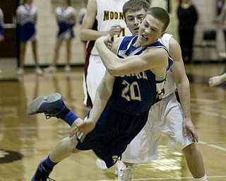 William d Lewis the vindicator Hubbard's Larry Minotti loses control of the ball while Mooney's Anthony filo applies pressure during Monday action at Boardman.