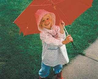 Little Ashley E. Kempe, 3, of Youngstown slipped out the back door with her new red boots and matching umbrella. (It looks to us like her boots made it on the wrong feet!)