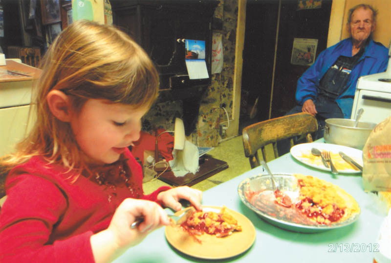 Madison Wright is enjoying a piece of cherry pie as her great granddad, John Kellner, watches to a make sure she doesn't eat it all. Photo taken by her grandma, Marilyn Cavanaugh of Columbiana.