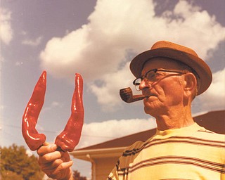 Michael Lacivita of Youngstown sent in this photo of his father, Giovanni (John) Lacivita, with two giant Italian sweet peppers.
