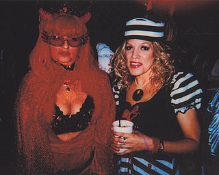 Deborah Carissimi of Boardman is pictured with Rose at a Halloween party.