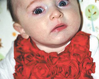 Dawn Dickey of North Lima shared this picture of her 4-month-old granddaughter, Molly Fisher, who was all dressed up for a wedding.