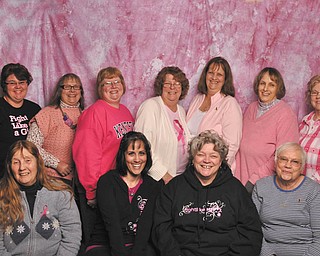 The Scrapbook Studio, located in the Pinetree Plaza, Niles, was recently the site of a 12-hour day of scrapbooking, card making and paper crafting designed to raise funds for Education Awareness for the Joanie Abdu Comprehensive Breast Care Center in Youngstown. The event raised more than $700 through raffles, auctions and donations. Participating were, from left to right, sitting, Bonnie Loomis, Angela Vincent, Gayle Wanamaker and Mickey Shimko. Standing are Becky Thomas, Anne Bean, Connie Riffle, Linda Rogers, Lynn Walters, Leslie Presnell and Beverly Miller.