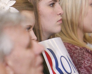 ROBERT K. YOSAY|THE VINDICATOR..Angela Murphy from Fitch - listens intently as Mitt talks - Mitt Romney, one of the front-runners for the Republican presidential bid, was the first of the GOP candidates to campaign in the Mahoning Valley. @ Taylor Winfield plant on Salt Springs Rd... ...-30-