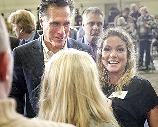 ROBERT K. YOSAY|THE VINDICATOR..Abbie Horman asenior from Fitch =- and Mitt mug for a friends camera ---.Mitt Romney, one of the front-runners for the Republican presidential bid, was the first of the GOP candidates to campaign in the Mahoning Valley. @ Taylor Winfield plant on Salt Springs Rd... ...-30-