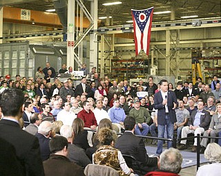 ROBERT K. YOSAY|THE VINDICATOR..Mitt Romney, one of the front-runners for the Republican presidential bid, was the first of the GOP candidates to campaign in the Mahoning Valley. @ Taylor Winfield plant on Salt Springs Rd... ...-30-