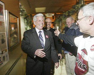 William D. Lewis the Vindicator Paul Gains wins prosecutors race. He gets congrats at election night party at Cafe Cimmento in Youngstown.